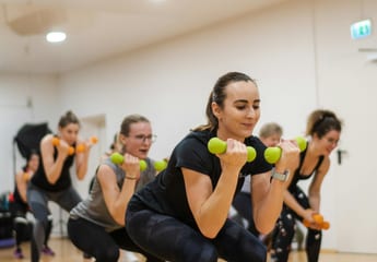 Client doing core exercises with kettlebell